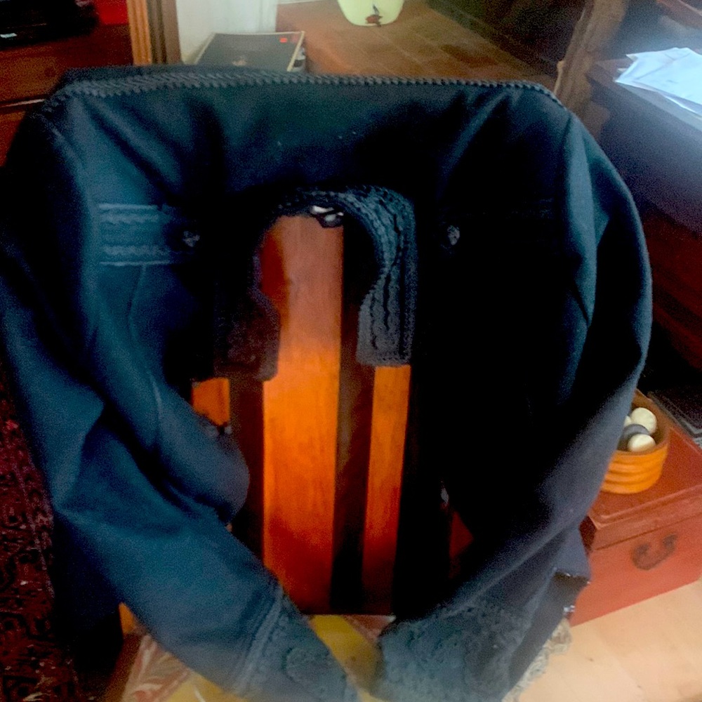 Black coat with nice details, almost military look,